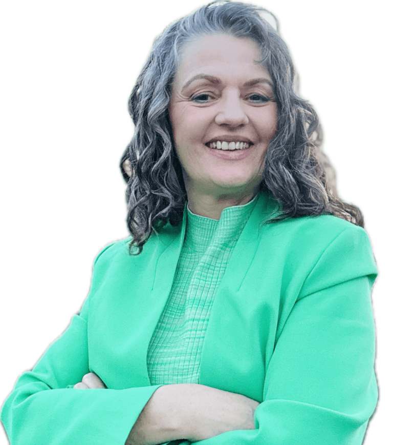 Claudia Windhagen in grünem Anzug vor blauem Himmel - Kandidatin für die Wahl der Gleichstellungsbeauftragten am UKS 2025